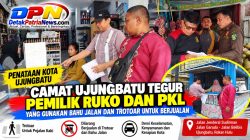 Camat Ujungbatu Tertibkan Ruko dan PKL di Jalan Sudirman